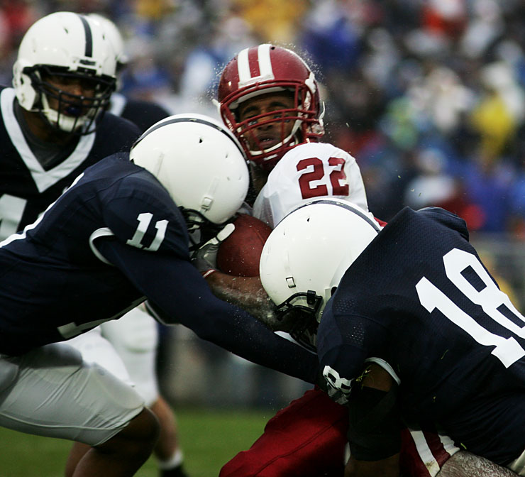 gridiron-football-players-getting-wet-in-the-rain